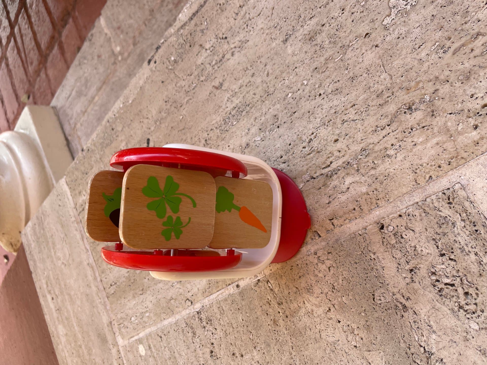 Baby sticking picture blocks  — image 1 of 1