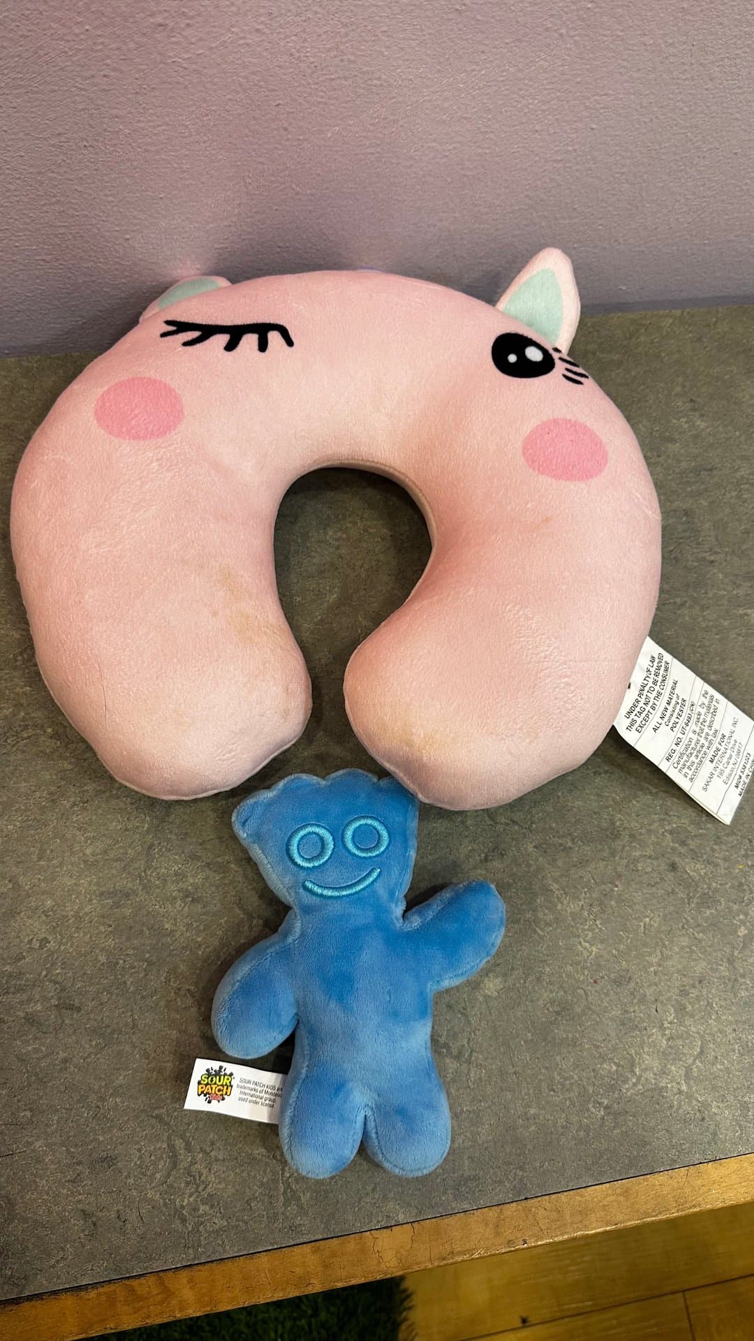 neck pillow and sour patch plush — image 1 of 1