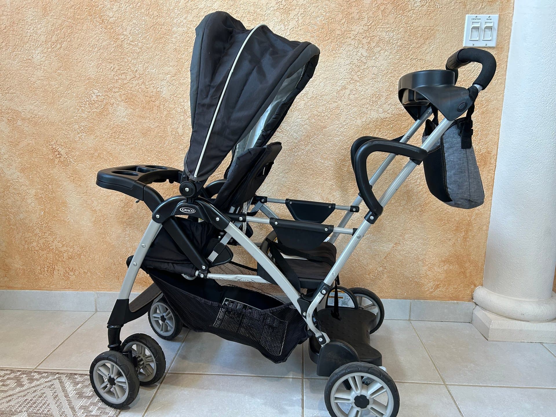 Stroller with sit-and-stand — image 1 of 6